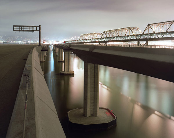 p24-25 A night view from the westbound new span looking east with the old span on the right, February 2, 2010 900px